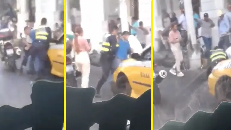 Taxista y agentes en San Miguel 1