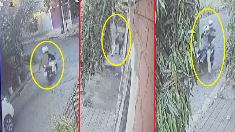 Motociclistas robando a mujer en San Miguel