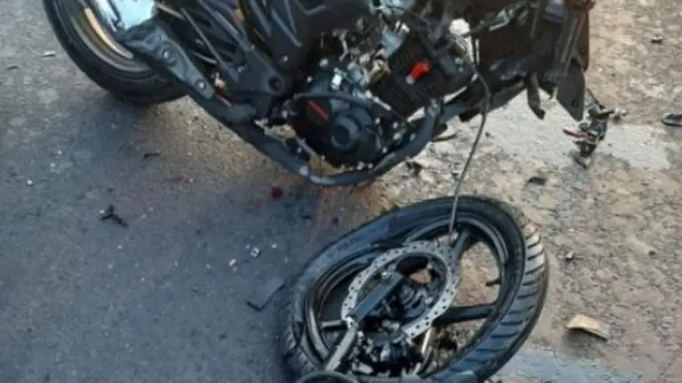 Policía muerto en moto