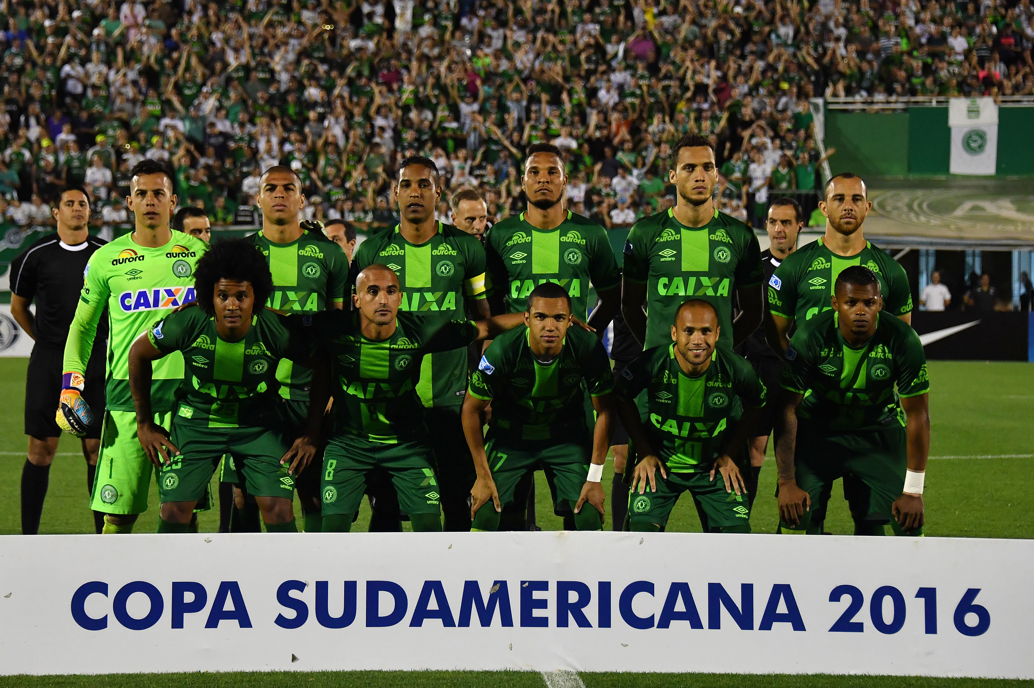 (FILES) This file photo taken on November 23, 2016 shows Brazil's Chapecoense players posing for pictures during their 2016 Copa Sudamericana semifinal second leg football match against Argentina's San Lorenzo  held at Arena Conda stadium, in Chapeco, Brazil.A plane carrying 81 people, including members of a Brazilian football team, crashed late on November 28, 2016 near the Colombian city of Medellin, officials said. The airport that serves Medellin said that among the 72 passengers and nine crew were members of Chapecoense Real, a Brazilian football club that was supposed to play against Colombia's Atletico Nacional Wednesday in the South American Cup finals.   / AFP PHOTO / NELSON ALMEIDA