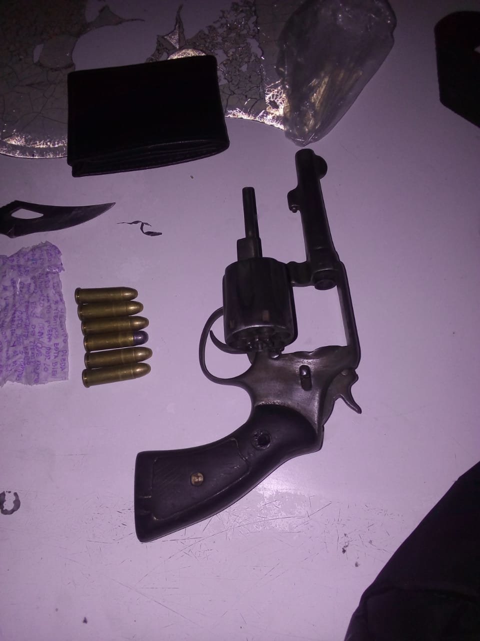 Pistola del presunto asaltante